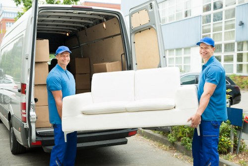 Removal team planning a move in Queens Park near residential properties