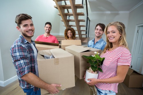 Commercial moving team planning a Queens Park business relocation
