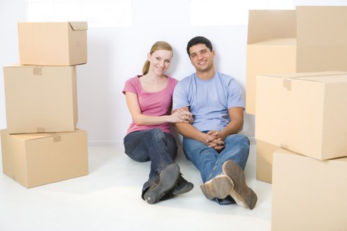 Office removals planning in Queens Park with boxes and desks