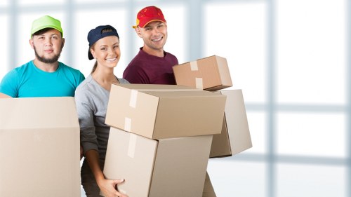 Queens Park man and van transporting boxes and furniture