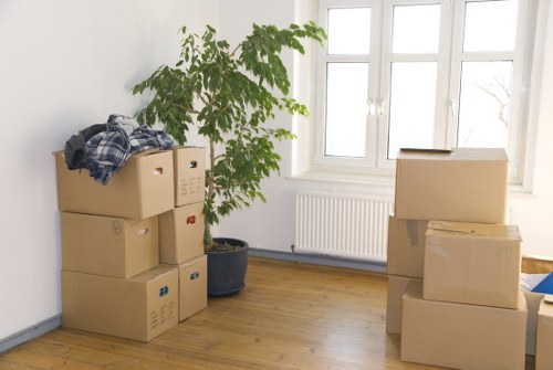 Grand piano relocation service in Queens Park with careful lifting and wrapping