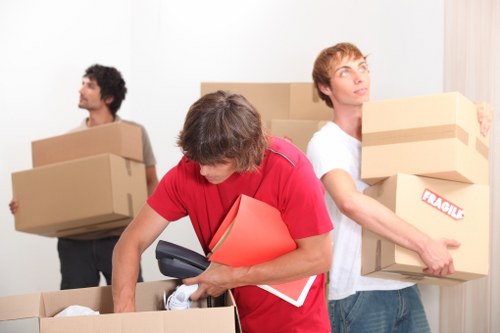 Local home moving team planning a Queens Park house relocation