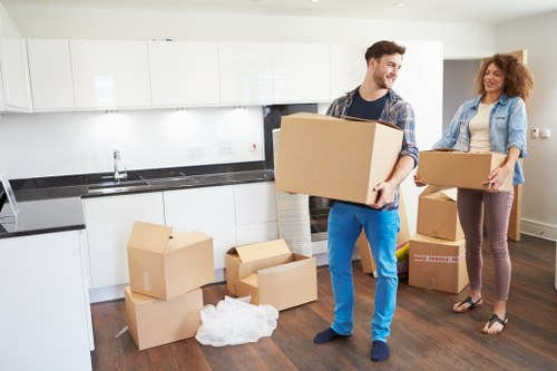 Boxes being unpacked and sorted in a Queens Park home after relocation
