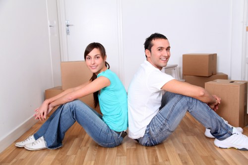 Local movers loading items for a Queens Park student relocation