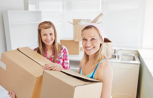 Prepared household items staged for collection by removal van